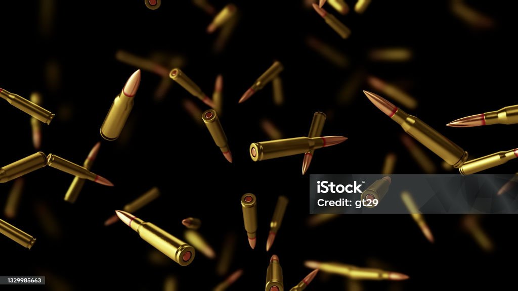 Falling bullets on a black background with depth of field. Falling bullets on a black background with depth of field. 3D rendering Bullet Stock Photo