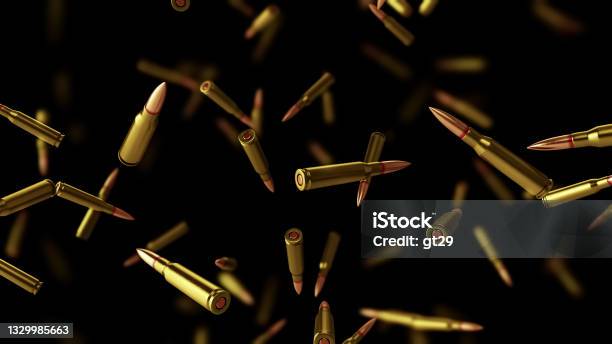 Falling Bullets On A Black Background With Depth Of Field Stock Photo - Download Image Now