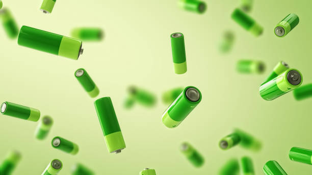 istock Multiple falling green batteries with depth of field. Green energy concept. 1329985664