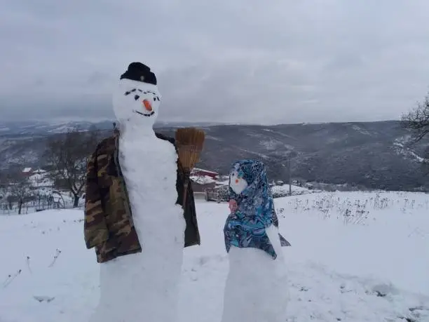 A pair snowman and snowwoman of big