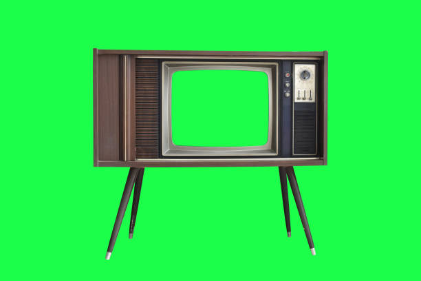 istock Vintage television with with green screen isolated on green background 1329990040