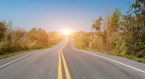 istock Empty asphalt road at sunrise or sunset background. Countryside landscape. 1329990064