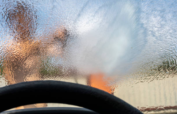 istock look through the blurred windshield of a car at a heavy downpour, flood 1329991329