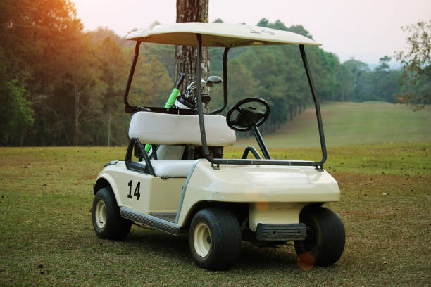 istock Golf car in the beautiful golf course in the evening golf course 1329992098