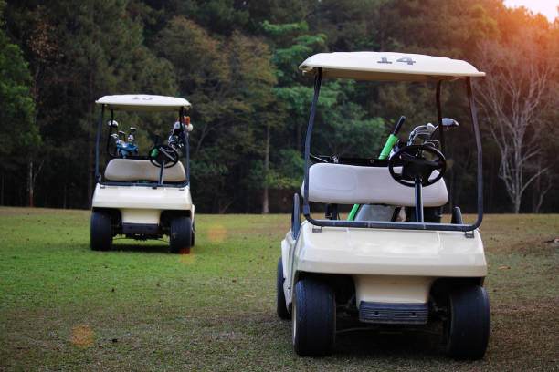 istock Golf car in the beautiful golf course in the evening golf course 1329992104