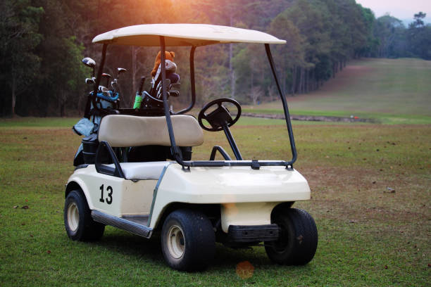 istock Golf car in the beautiful golf course in the evening golf course 1329992108