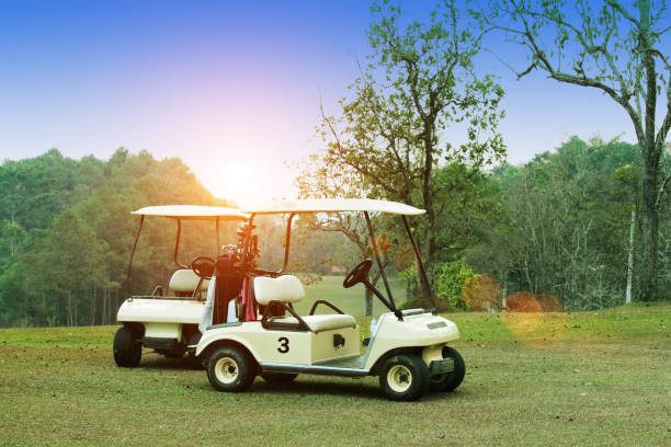 istock Golf car in the beautiful golf course in the evening golf course 1329992115