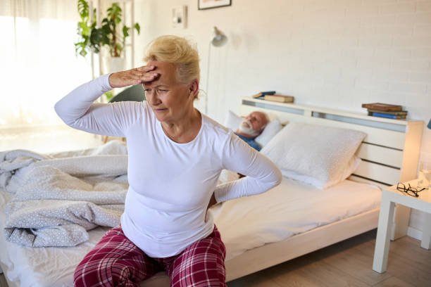 istock A senior woman has a morning headache 1329992304