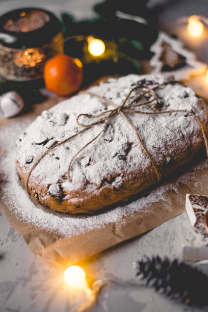 istock Traditional german stollen cake with Christmas decorations. 1329995328