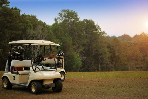 istock Golf car in beautiful golf course in the evening golf course 1329996792