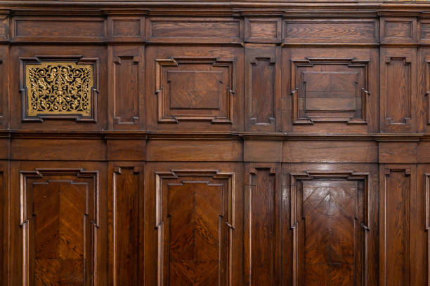 istock Antique old retro wooden decorative panel with vintage golden frames. 1330004015