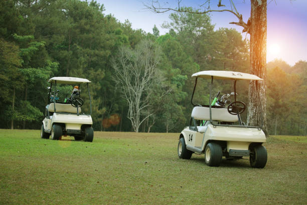 istock Golfcar in beautiful golf course in the evening golf course 1330004559