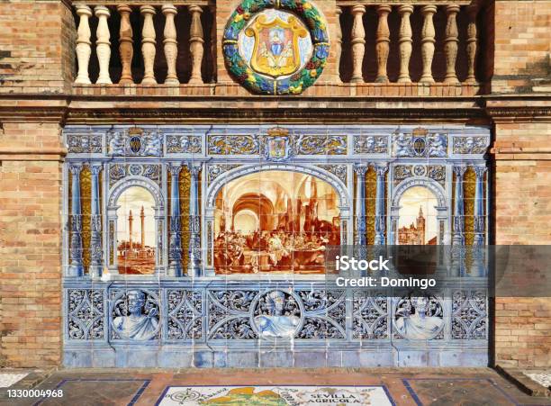 Image With A Historical Scene Painted On Ceramic Tiles Which Represents Agriculture In Andalusia Seating Benches In Spain Square In Seville Stock Photo - Download Image Now