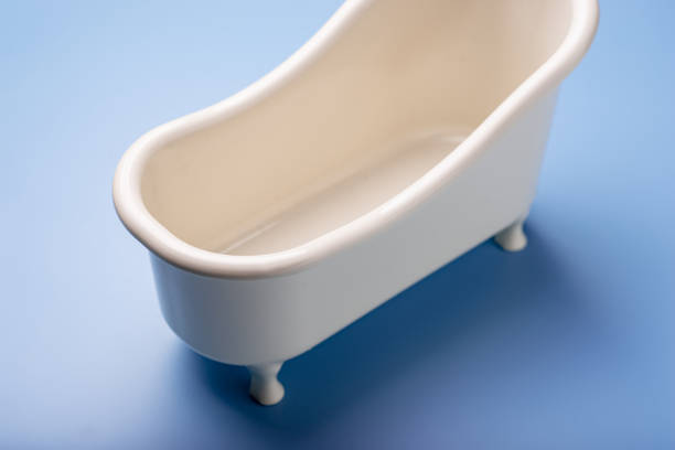 istock Empty toy bath on a blue background. The concept of cleanliness, hygiene. 1330005670
