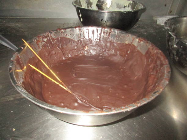 istock Messy bread dough in a utensil basin. 1330011033
