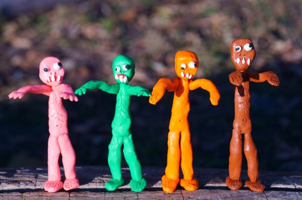 istock Funny colorful zombie figures in the forest. 1330013310