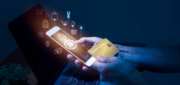 istock Man's hand holding credit and using smartphone. Cyberspace Security and Data Protection and Privacy Verification Technology Concept 1330014717