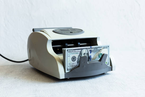 istock electronic currency counter isolated on white 1330020336
