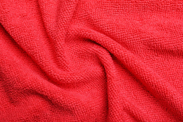 istock Crumpled red microfiber cloth as background, closeup 1330022908