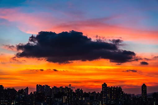 Cityscape and skyline at victoria harbour in hong kong city at sunset time
