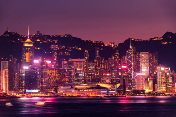 istock Hong Kong neon sunset iconic harbour skyscrapers 1330024744