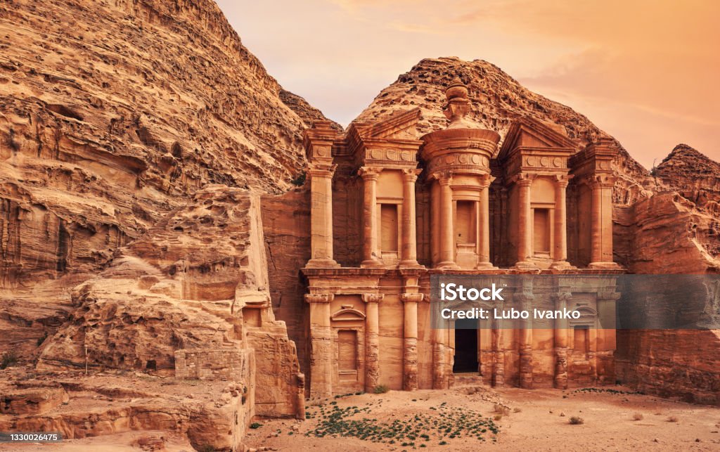 Ad Deir - Monastery - ruins carved in rocky wall at Petra Jordan Ad Deir - Monastery - ruins carved in rocky wall at Petra Jordan. Petra - Jordan Stock Photo