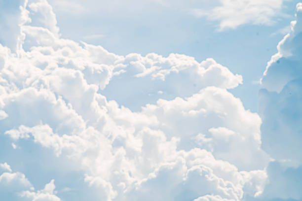 istock Beautiful white fluffys clouds sky background 1330027532