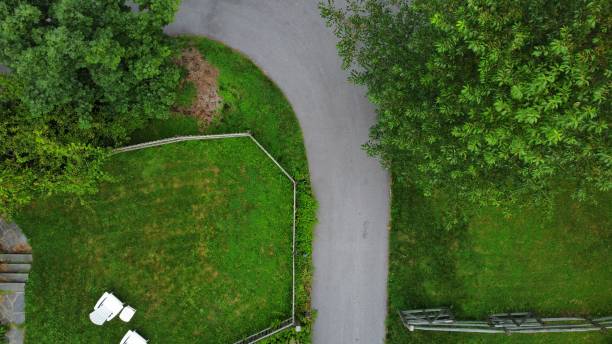istock Simple driveway and yard with beautiful grass 1330027706