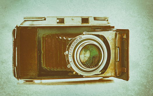 Retro camera, more than 60 years old, with solarized effect.