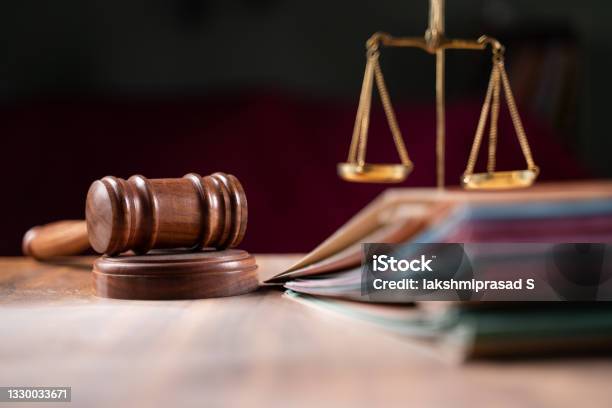 Focus On Hammer Group Of Files On Judge Table Covered With Dust Concept Of Pending Old Cases Or Work At Judicial Court Stock Photo - Download Image Now