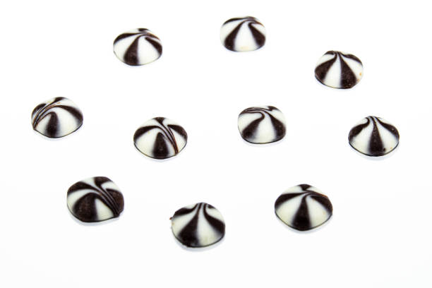 assorted chocolates confectionery with copy space, on white background