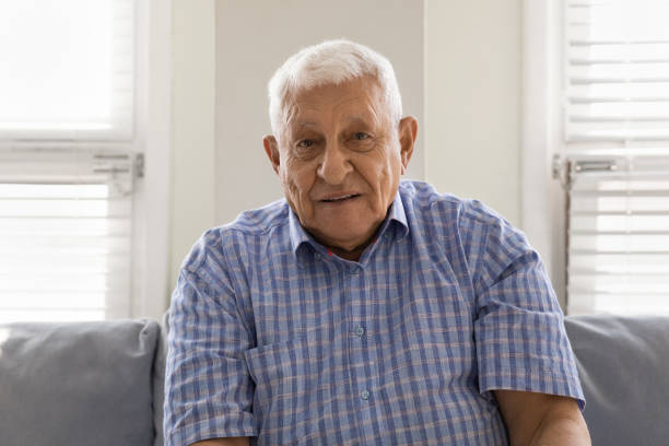 istock Portrait of old man talk on video call on device 1330045925