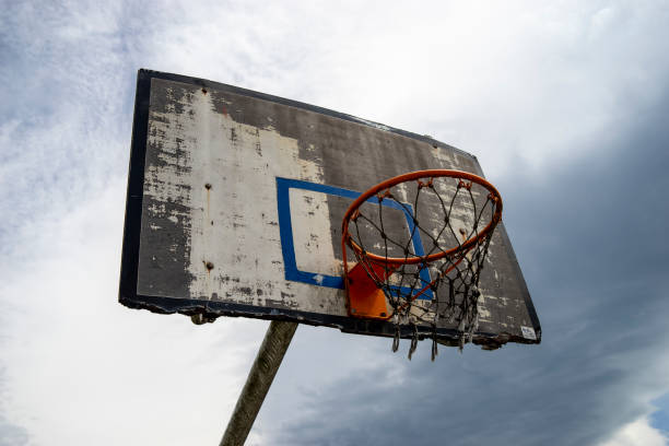 wooden basket on an abandoned basketball court, northern croatia