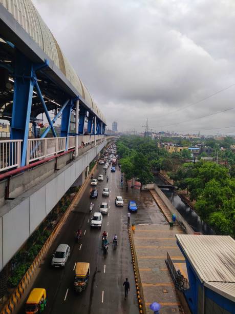 istock Delhi Metro passing through Noida Sec 62 1330046755