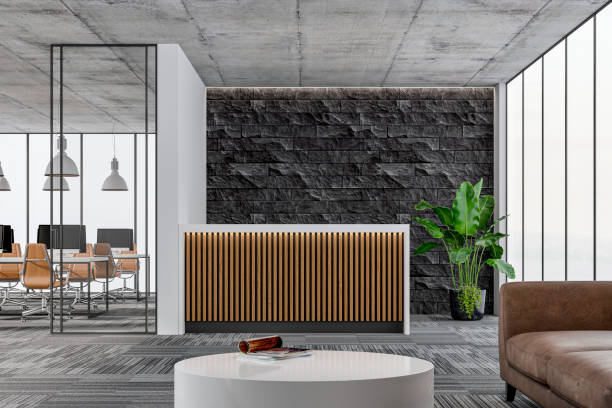 istock Large office interior: a reception desk, a lounge corner with copy space and wordesks behind glass door 1330047460