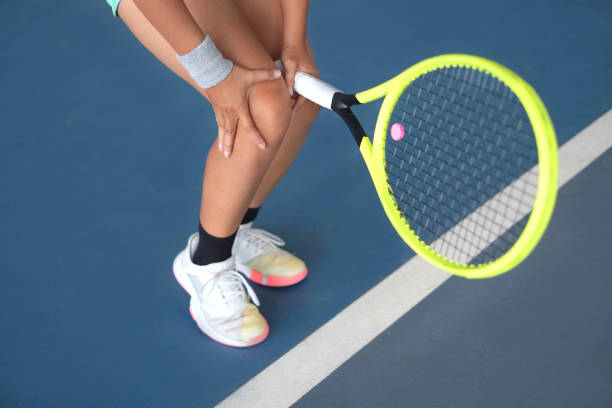 istock Unrecognizable Tennis Player Suffering a Knee Pain 1330054941