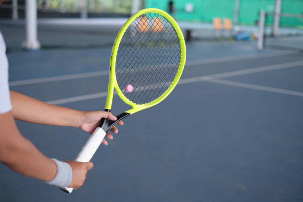 istock Asian Female Tennis Player in Ready Position 1330054942