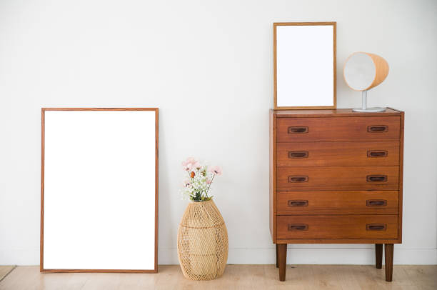 istock empty picture frames collages on wooden cabinet. 1330055115