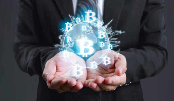 istock Hands showing bitcoin as virtual money on digital 1330058981