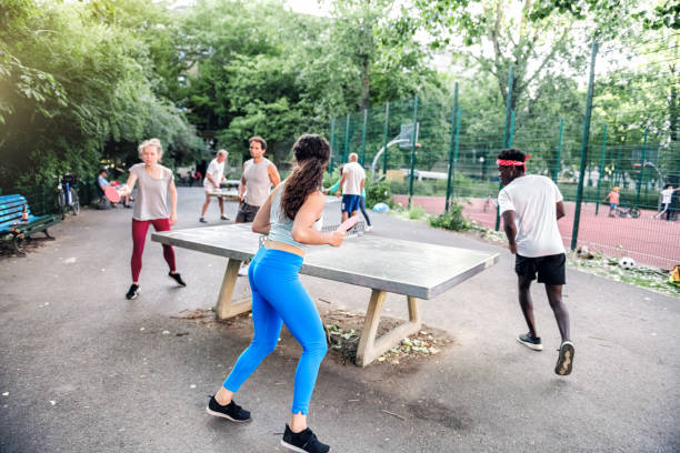 istock young people playing table tennis round around 1330059777