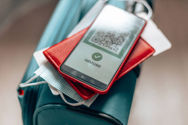 istock Vaccination, disease immunity passport on screen smartphone ,digital vaccination certificate for travel during covid-19 pandemic. 1330062399