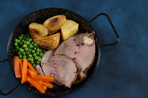 Slow evenly cooked Roast Beef and accompanying vegetables for a worthy lunch. High resolution 45Mp image using Canon EOS R5 with associate lens