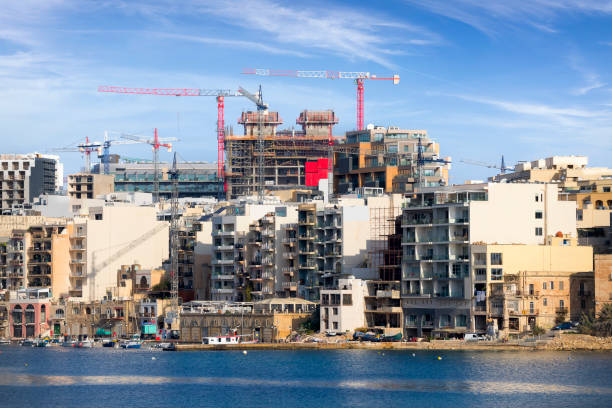 Construction development in Malta Construction of new hotels and apartment buildings in Paceville, Malta st julians bay stock pictures, royalty-free photos & images