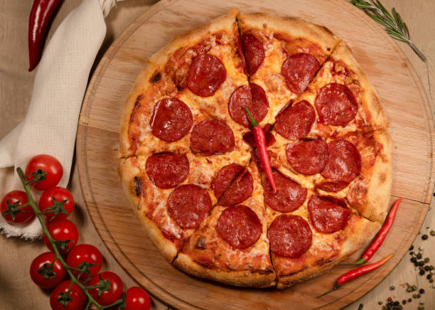 istock Pizza tomato pepperoni italian dreams 1330077859