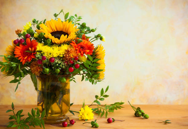 istock autumnal flowers and berries 1330079308
