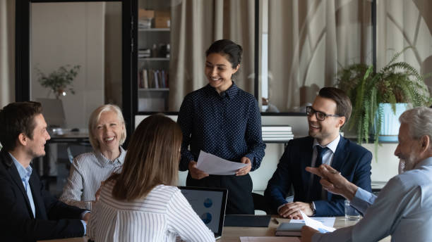 istock Happy diverse team with Indian business leader 1330082281