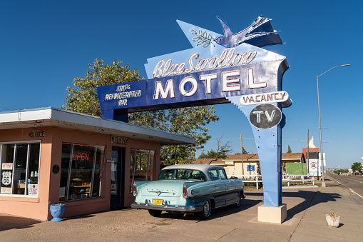 Tucamcari, New Mexico - May 6, 2021: Blue Swallow Motel neon sign, a famous classic Route 66 motel