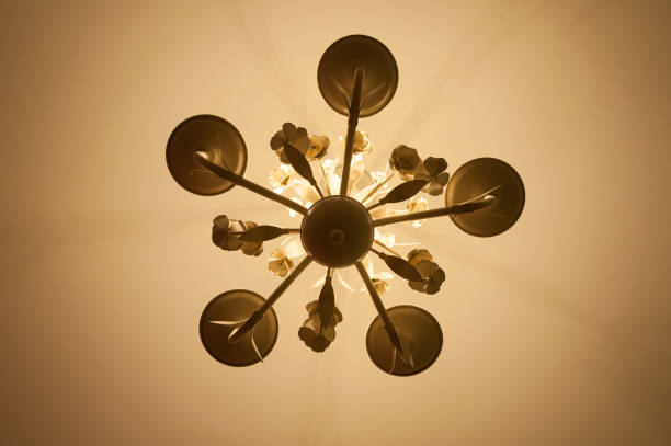 istock Simple chandelier bottom view with ceiling background 1330088354