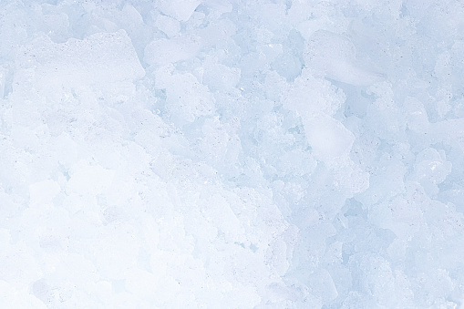 Crushed ice texture background. Pile of crushed ice cubes.