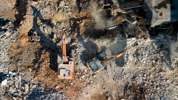 istock Excavator demolish building. View from above 1330096108